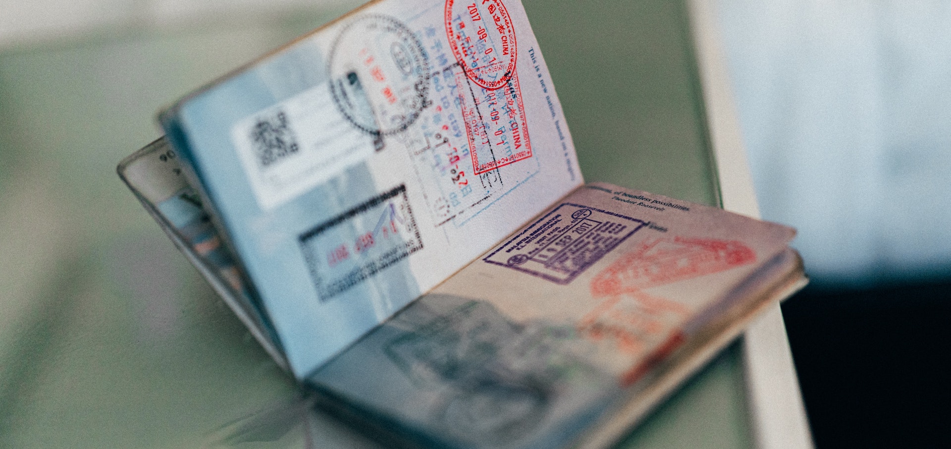 Open passport with stamps in it